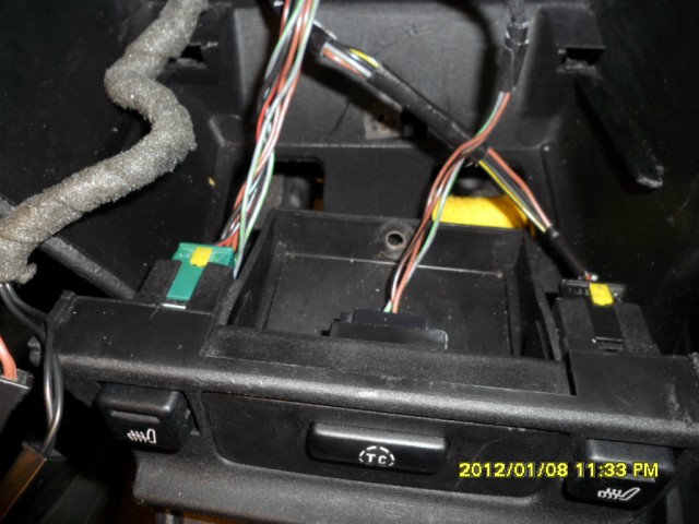 Heated Seat & TC Buttons Housing Being Removed.JPG