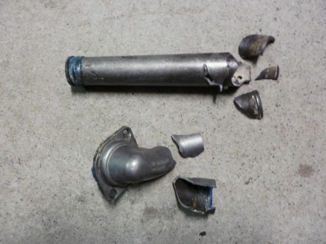 Thermostat Housing and Extension Pipe Both Smashed.JPG